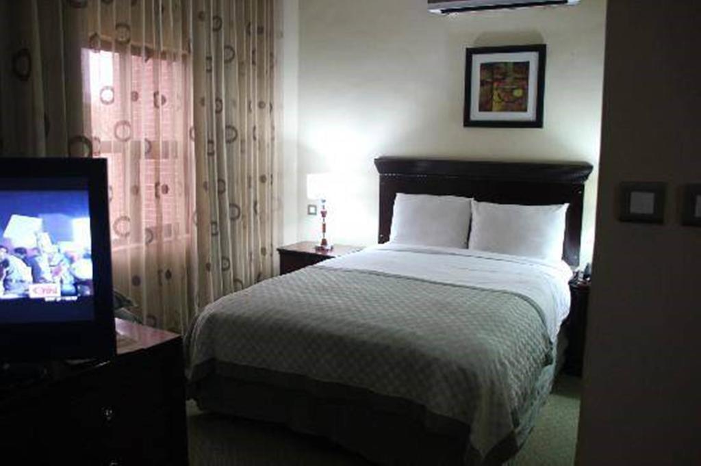 Denis Hotel Abuja Mobushipe Habitación foto